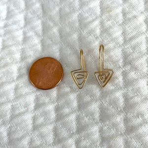 Gold metal design earrings